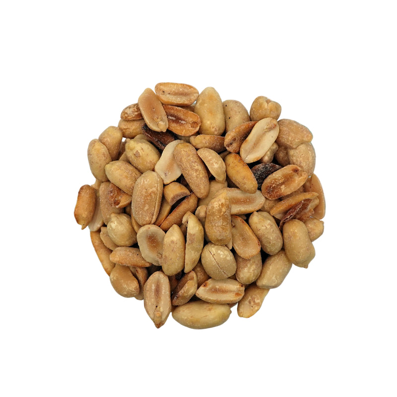 Roasted peanuts in a clear glass bowl, photographed from a top-down view on a clean white background.