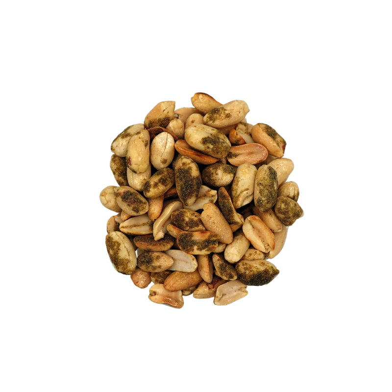 A top-down view of a clear glass bowl filled with Smoky Jalapeño Peanuts, on a plain white background.
