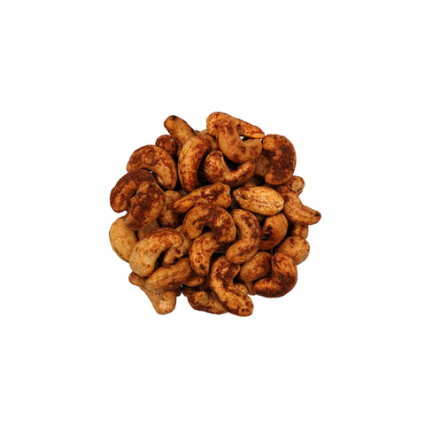 A top-down view of Spicy Habanero Cashews in a clear glass bowl, centered on a plain white background.